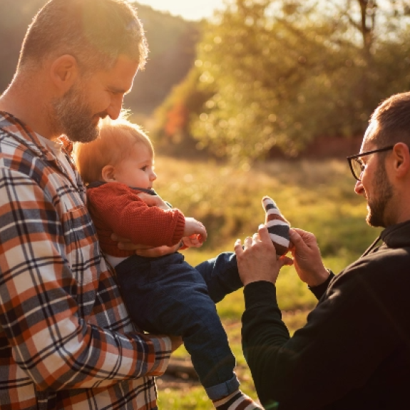 Two men and a baby